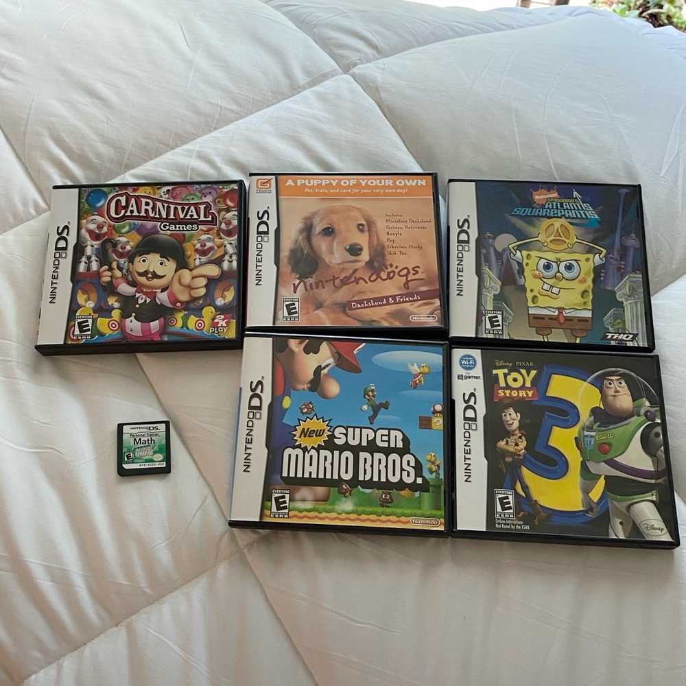 Bundle of 11 Nintendo DS games. Mario, Nintendogs, Toy Story, Math game, etc